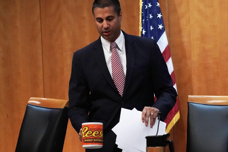 WASHINGTON, DC - DECEMBER 14: Federal Communications Commission Chairman Ajit Pai takes his seat during a commission meeting December 14, 2017 in Washington, DC. FCC has voted to repeal its net neutrality rules at the meeting. (Photo by Alex Wong/Getty Images)